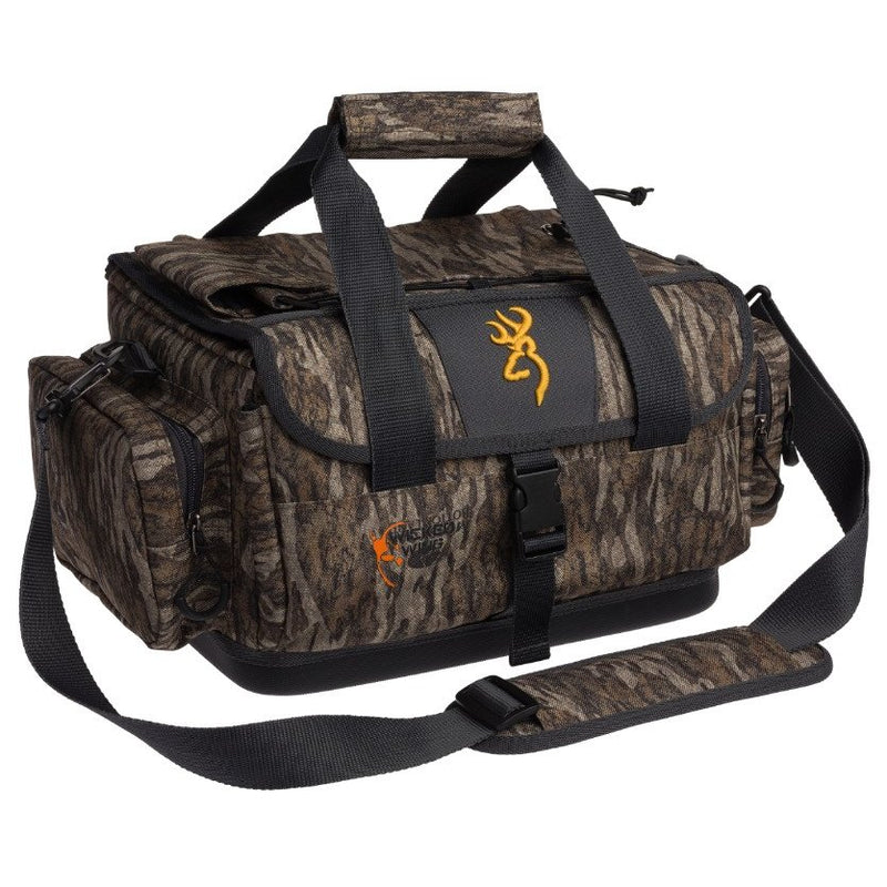 Load image into Gallery viewer, A Browning Wicked Wing Blind Bag in camouflage design with multiple pockets, sturdy straps, and the Browning logo, ideal for hunting and outdoor gear storage.
