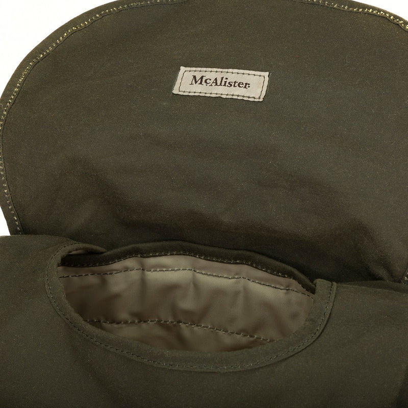 Load image into Gallery viewer, Inside of the Drake McAlister Wingshot Ditty Bag in the color Olive.
