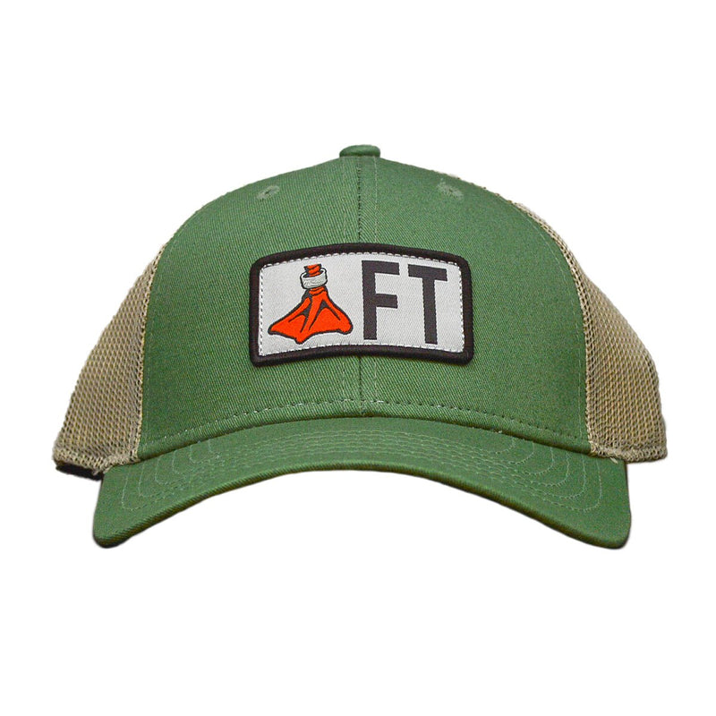 Load image into Gallery viewer, Front view of the Fort Thompson Duck Foot Scout Patch FT Cap in Green/Tan featuring the Fort Thompson duck foot and the letters FT on a white patch centered on the hat.
