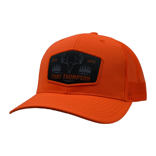 Fort Thompson Mesh Back Logo Cap Patch - Blaze Orange with a Fort Thompson patch on the front center of the hat.