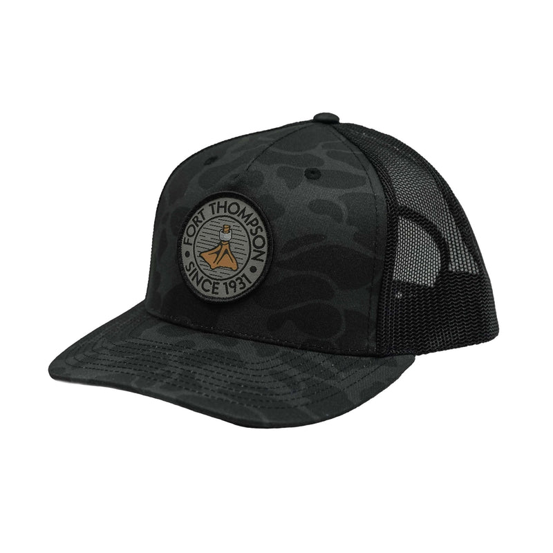 Load image into Gallery viewer, Fort Thompson Woven Patch Cap in the color Black Camo.
