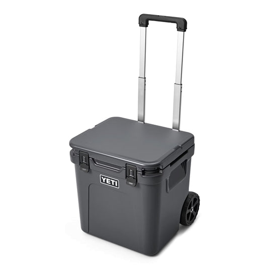 YETI Roadie 48 Wheeled Cooler Hard Cooler in the color Charcoal.
