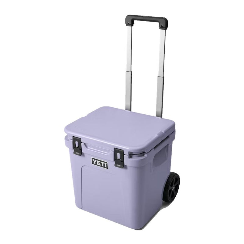 Load image into Gallery viewer, YETI Roadie 48 Wheeled Cooler Hard Cooler in the color Cosmic Lilac.
