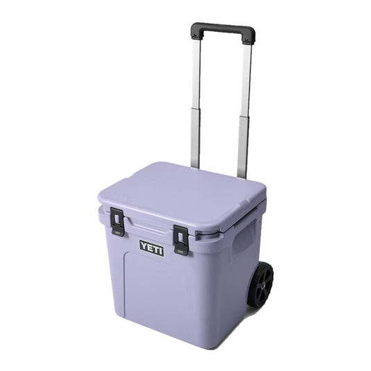 YETI Roadie 48 Wheeled Cooler Hard Cooler in the color Cosmic Lilac.